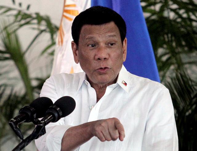 FILE PHOTO: President Rodrigo Duterte speaks after his arrival, from a visit in Israel and Jordan at Davao International airport in Davao City in southern Philippines, September 8, 2018. REUTERS/Lean Daval Jr./File Photo