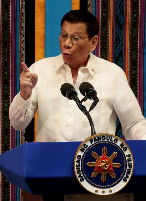 FILE PHOTO: Philippine President Rodrigo Duterte gestures during his fourth State of the Nation Address at the Philippine Congress in Quezon City, Metro Manila, Philippines July 22, 2019. REUTERS/Eloisa Lopez/File Photo