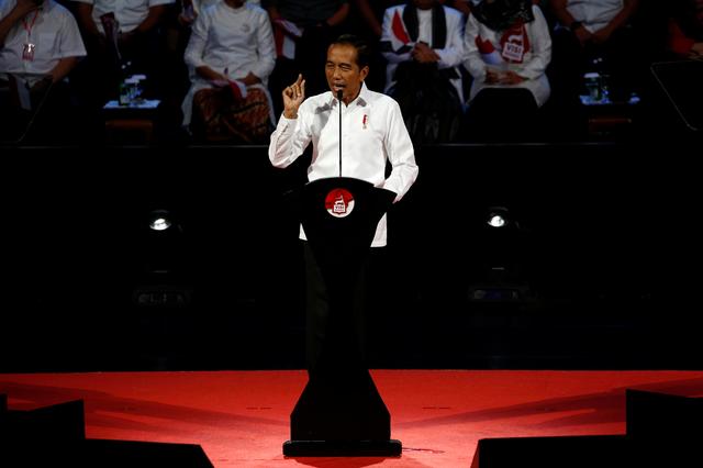 FILE PHOTO: Indonesia's incumbent president Joko Widodo, who was re-elected on April's election gestures as he delivers a speech to highlight his vision for the next five years in Bogor, West Java province, Indonesia, July 14, 2019. REUTERS/Willy Kurniawan
