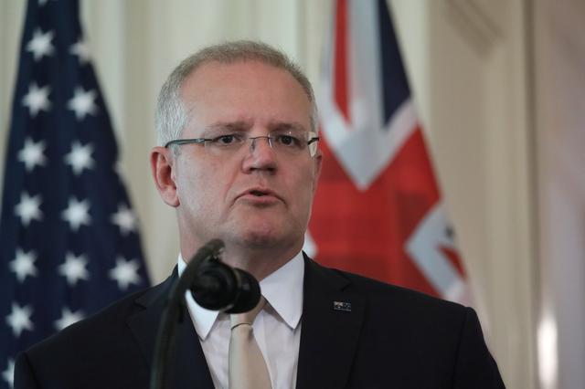 FILE PHOTO: Australia’s Prime Minister Scott Morrison speaks during a joint news conference with U.S. President Donald Trump in the East Room of the White House in Washington, U.S., September 20, 2019. REUTERS/Jonathan Ernst