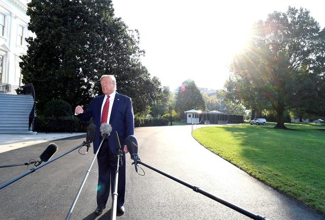 U.S. President Donald Trump responds to reporter's questions as he departs to Texas from the White House, Washington, DC, U.S., September 22, 2019. REUTERS/Mike Theiler