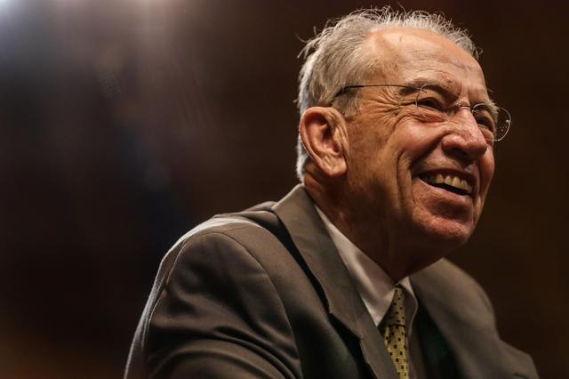 FILE PHOTO: Senator Chuck Grassley (R-IA) arrives before a Senate Judiciary Constitution Subcommittee hearing titled Stifling Free Speech: Technological Censorship and the Public Discourse. on Capitol Hill in Washington, U.S., April 10, 2019. REUTERS/Jeenah Moon