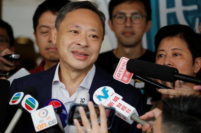 FILE PHOTO: One of the former leaders of the 2014 Occupy Central pro-democracy movement, also known as the Umbrella Movement, Benny Tai speaks to the media as he leaves the high court after being released on bail in Hong Kong, China August 15, 2019. REUTERS/Ann Wang