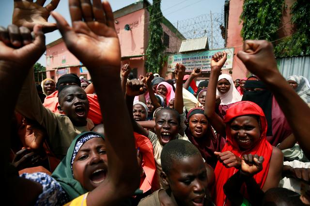 Children protest outside the building where hundreds of men and boys were rescued from captivity by police in Kaduna, Nigeria September 28, 2019. REUTERS/Afolabi Sotunde