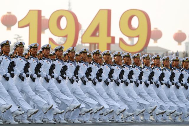 Soldiers of People's Liberation Army (PLA) march in formation past Tiananmen Square during a rehearsal before a military parade marking the 70th founding anniversary of People's Republic of China, on its National Day in Beijing, China October 1, 2019.  REUTERS/Thomas Peter