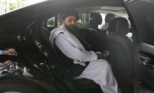 FILE PHOTO: Taliban chief negotiator Mullah Abdul Ghani Baradar sits in a car after the end of peace talks with Afghan senior politicians in Moscow, Russia May 30, 2019. REUTERS/Evgenia Novozhenina