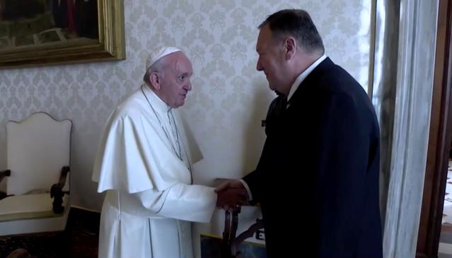 U.S. Secretary of State Mike Pompeo shakes hands with Pope Francis on the sidelines of a symposium at the Vatican, October 3, 2019 in this still image taken from a video. Vatican Media/Reuters TV via REUTERS   
