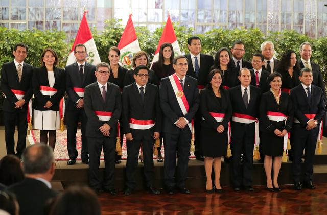Peru's President Martin Vizcarra and newly appointed ministers pose for a picture during their swearing-in ceremony at the government palace in Lima, Peru October 3, 2019. REUTERS/Guadalupe Pardo