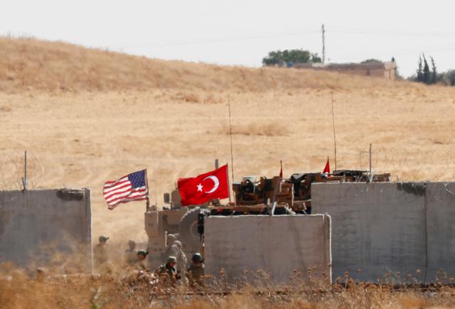 FILE PHOTO: Turkish and U.S. troops return from a joint U.S.-Turkey patrol in northern Syria, as it is pictured from near the Turkish town of Akcakale, Turkey, September 8, 2019. REUTERS/Murad Sezer/File Photo