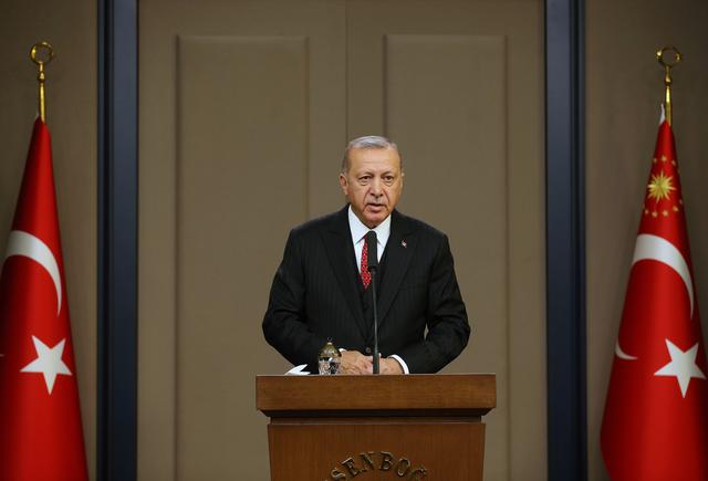 FILE PHOTO: Turkish President Tayyip Erdogan speaks at Esenboga Airport in Ankara, Turkey, October 7, 2019. Mustafa Kamaci/Presidential Press Office/Handout via REUTERS