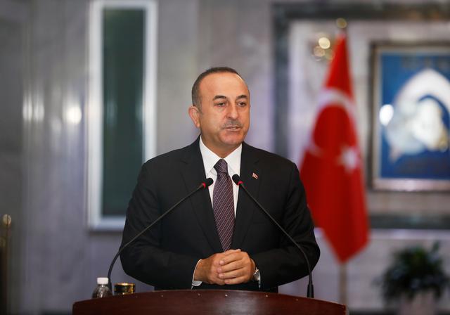 FILE PHOTO: Turkish Foreign Minister Mevlut Cavusoglu speaks during a news conference with Iraqi Foreign Minister Mohamed Ali Alhakim in Baghdad, Iraq April 28, 2019. REUTERS/Khalid Al-Mousily
