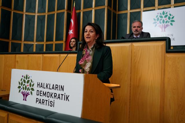 FILE PHOTO: Pervin Buldan, co-leader of the pro-Kurdish Peoples' Democratic Party (HDP), speaks before starting a two-day hunger strike in support of jailed Kurdish lawmaker Leyla Guven's own hunger strike against the isolation of Kurdish rebel leader Abdullah Ocalan in prison, at the Turkish Parliament in Ankara, Turkey December 4, 2018. REUTERS/Umit Bektas/File Photo