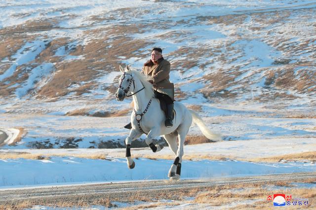 North Korean leader Kim Jong Un rides a horse during snowfall in Mount Paektu in this image released by North Korea's Korean Central News Agency (KCNA) on October 16, 2019. KCNA via REUTERS  