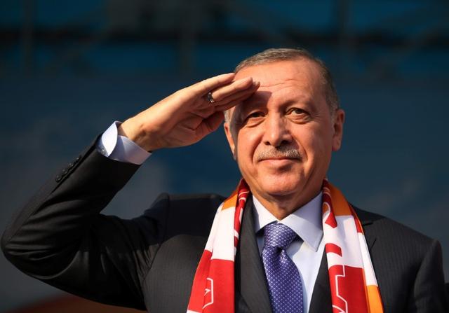 Turkish President Tayyip Erdogan salutes during a gathering in Kayseri, Turkey, October 19, 2019. Mustafa Kamaci/Presidential Press Office/Handout via REUTERS 