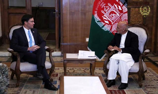 FILE PHOTO: Afghanistan's President Ashraf Ghani meets with U.S. Defense Secretary Mark Esper in Kabul, Afghanistan, October 20, 2019. Picture taken October 20, 2019. Afghan Presidential Palace/Handout via REUTERS/File Photo