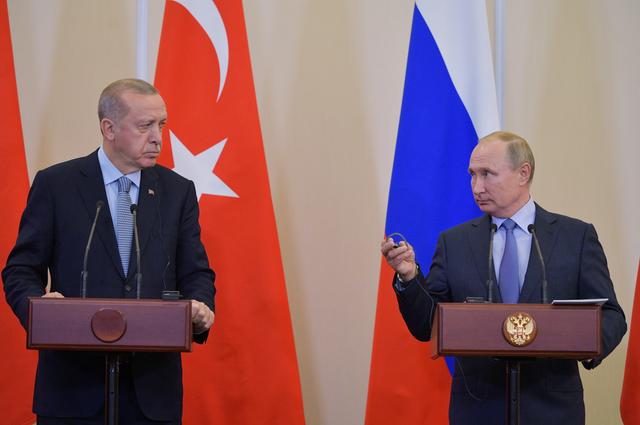 Russian President Vladimir Putin and Turkish President Tayyip Erdogan attend a news conference following their talks in Sochi, Russia October 22, 2019. Sputnik/Alexei Druzhinin/Kremlin via REUTERS 