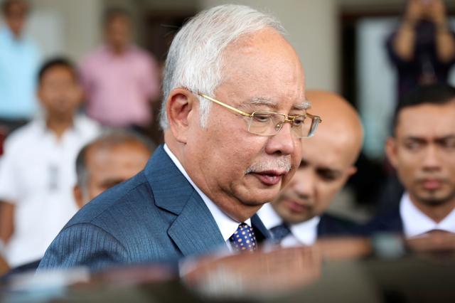 FILE PHOTO: Former Malaysian Prime Minister Najib Razak leaves Kuala Lumpur High Court in Kuala Lumpur, Malaysia, August 19, 2019. REUTERS/Lim Huey Teng