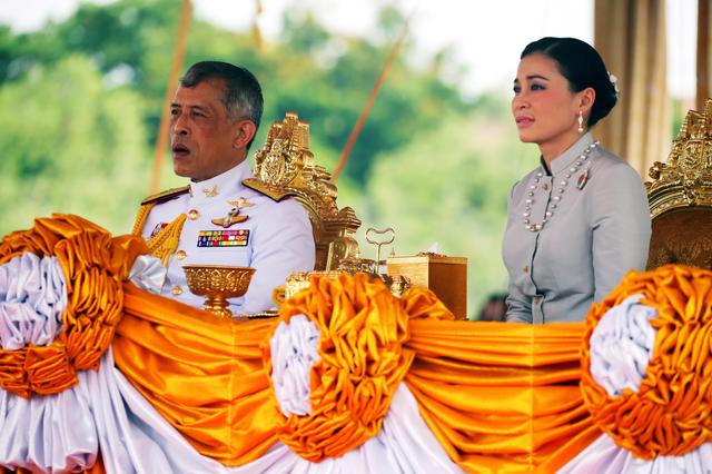 FILE PHOTO: Thailand's King Maha Vajiralongkorn and Queen Suthida attend the annual Royal Ploughing Ceremony in central Bangkok, Thailand, May 9, 2019. REUTERS/Athit Perawongmetha/File Photo
