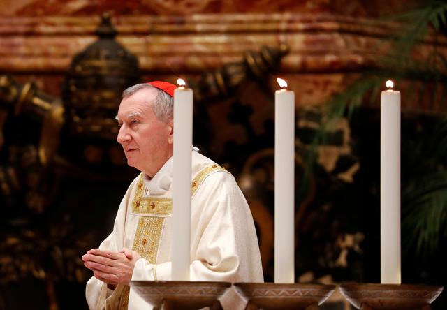 FILE PHOTO: Italian cardinal Pietro Parolin leads a special mass for peace in the Korean peninsula in Saint Peter's Basilica at the Vatican, October 17, 2018. REUTERS/Max Rossi/File Photo
