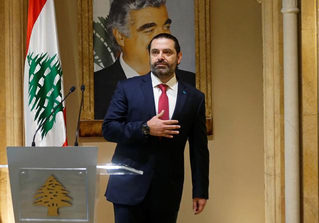 FILE PHOTO: Lebanon's Prime Minister Saad al-Hariri gestures as he leaves after delivering his address in Beirut, Lebanon October 29, 2019. REUTERS/Mohamed Azakir/File Photo