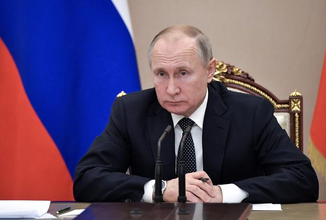 FILE PHOTO: Russian President Vladimir Putin chairs a meeting with members of the government in Moscow, Russia December 11, 2019. Sputnik/Aleksey Nikolskyi/Kremlin via REUTERS