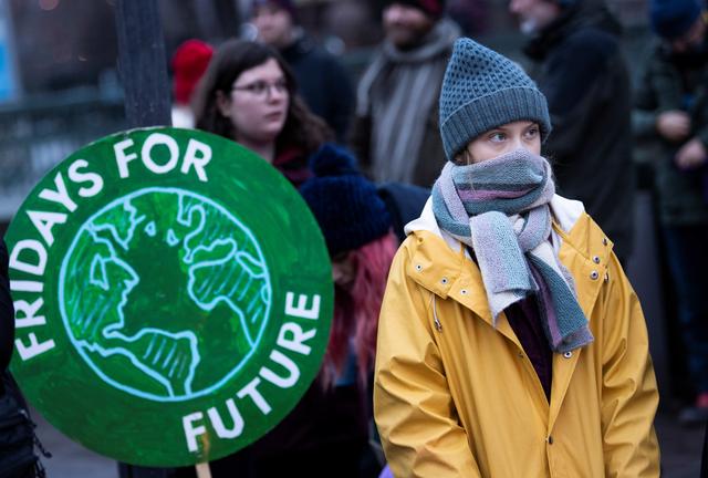 Swedish environmental activist Greta Thunberg attends a climate strike of the Fridays For Future movement outside the Swedish parliament Riksdagen in Stockholm, December 20, 2019. TT News Agency/Pontus Lundahl via REUTERS