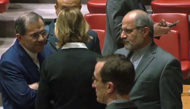 U.S. Ambassador to the United Nations Kelly Craft speaks with Iran's U.N. Ambassador Majid Takht Ravanchi in the U.N. Security Council chamber in New York City, U.S. in a still image from video taken December 19, 2019.  UN TV via REUTERS.  