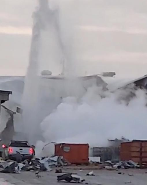 Gas and liquid gushes into the air after a nitrogen tank explosion at a Textron Aviation Inc. Beechcraft facility in Wichita, Kansas, U.S., December 27, 2019 in this still image obtained from social media video. Shane Haberlein via REUTERS 