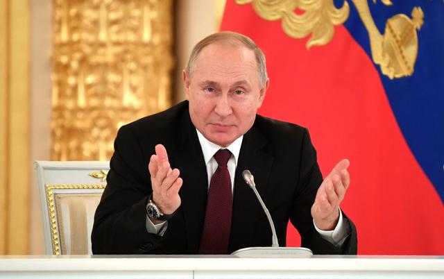 FILE PHOTO: Russian President Vladimir Putin speaks during his meeting with business community at the Kremlin in Moscow, Russia December 25, 2019. Alexander Nemenov/Pool via REUTERS