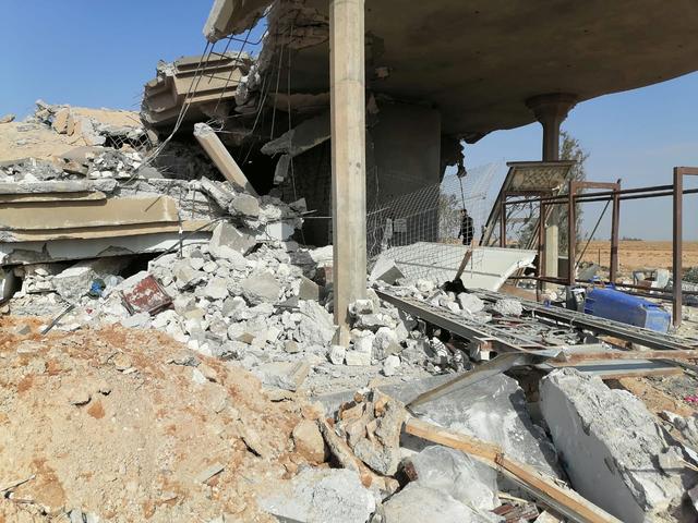 Destroyed headquarters of Kataib Hezbollah militia group are seen after in an air strike in Qaim, Iraq, December 30, 2019. REUTERS/Stringer 