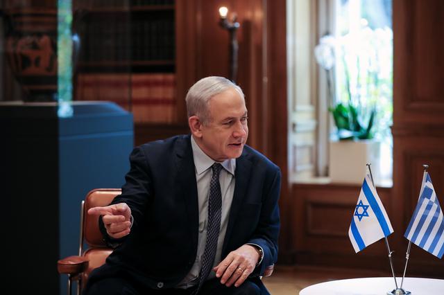 FILE PHOTO: Israeli Prime Minister Benjamin Netanyahu meets with Greek Prime Minister Kyriakos Mitsotakis (not pictured) at the Maximos Mansion in Athens, Greece, January 2, 2020. REUTERS/Alkis Konstantinidis