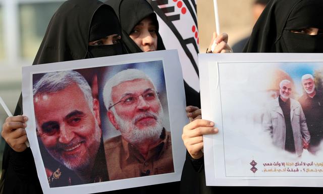 Mourners attend the funeral of the Iranian Major-General Qassem Soleimani, top commander of the elite Quds Force of the Revolutionary Guards, and the Iraqi militia commander Abu Mahdi al-Muhandis, who were killed in an air strike at Baghdad airport, in Baghdad, Iraq, January 4, 2020. REUTERS/Thaier al-Sudani