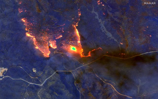 A satellite image shows wildfires burning east of Obrost, Victoria, Australia January 4, 2020. Satellite image ©2020 Maxar Technologies/Handout via REUTERS. 