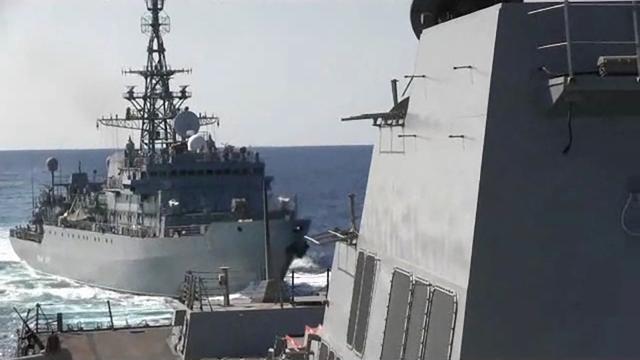 A Russian naval ship sails close to the U.S. Navy destroyer USS Farragut during an incident in the northern Arabian Sea January 9, 2020 in a still image from video. Video taken January 9, 2020. U.S. Navy/Petty Officer 3rd Class Dawson Roth/Handout via REUTERS   