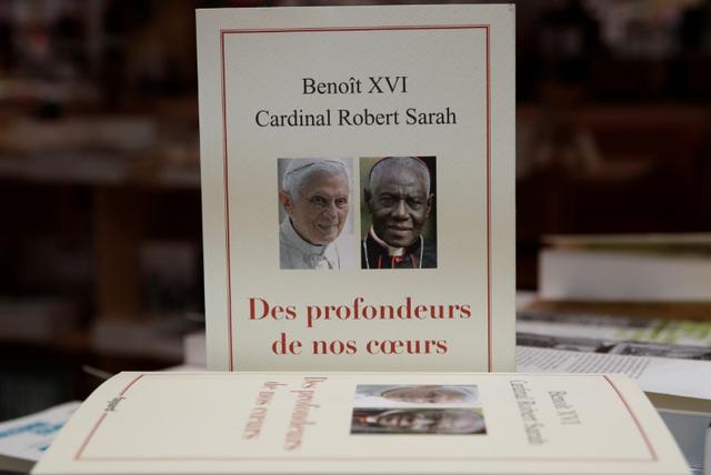 The book From the Depths of Our Hearts, co-written by retired pope Benedict XVI, is on display in a bookshop in Paris, France, January 15, 2020. REUTERS/Gonzalo Fuentes