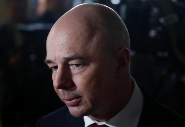 FILE PHOTO: Russian Finance Minister Anton Siluanov is seen before President Vladimir Putin's annual address to the Federal Assembly in Moscow, Russia January 15, 2020. REUTERS/Maxim Shemetov