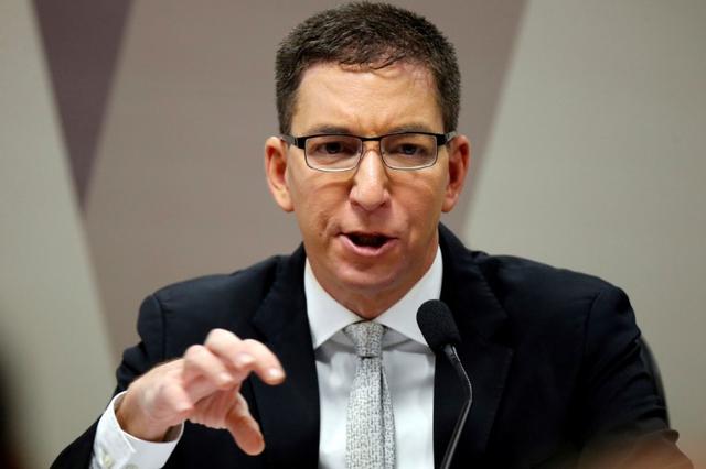 FILE PHOTO: Author and journalist Glenn Greenwald speaks during a meeting at Commission of Constitution and Justice in the Brazilian Federal Senate in Brasilia, Brazil July 11, 2019. REUTERS/Adriano Machado/File Photo