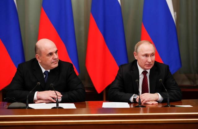 Russian President Vladimir Putin and Prime Minister Mikhail Mishustin hold a meeting with members of the new government in Moscow, Russia January 21, 2020. Sputnik/Dmitry Astakhov/Kremlin via REUTERS 