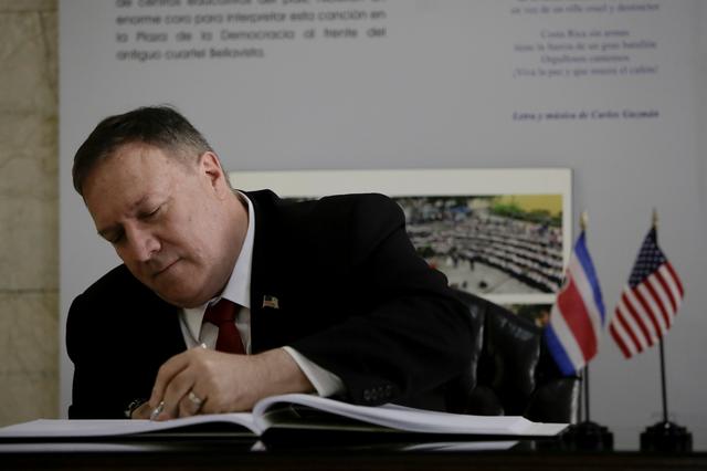 U.S. Secretary of State Mike Pompeo signs a document during a meeting at the Presidential house in San Jose, Costa Rica January 21, 2020. REUTERS/Juan Carlos Ulate