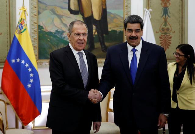 Venezuela's President Nicolas Maduro shakes hands with Russia's Foreign Minister Sergey Lavrov at Miraflores Palace in Caracas, Venezuela February 7, 2020. REUTERS/Manaure Quintero