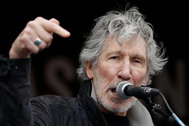 Singer Roger Waters speaks during a protest against the extradition of Julian Assange, at the Parliament Square in London, Britain, February 22, 2020. REUTERS/Peter Nicholls