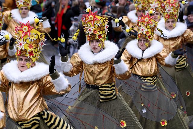 Revellers in costumes attend a carnival parade in Aalst, Belgium February 23, 2020. REUTERS/Yves Herman  