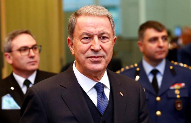 FILE PHOTO: Turkey's Defence Minister Hulusi Akar attends a NATO defence ministers meeting at the Alliance headquarters in Brussels, Belgium February 12, 2020. REUTERS/Francois Lenoir