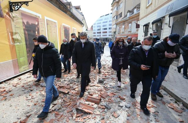 Croatia's Prime Minister Andrej Plenkovic walks at an area affected by an earthquake in Zagreb, Croatia March 22, 2020. REUTERS/Antonio Bronic's Prime Minister Andrej Plenkovic walks at an area affected by an earthquake in Zagreb, Croatia March 22, 2020. REUTERS/Antonio Bronic