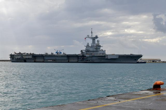FILE PHOTO: French Navy aircraft carrier Charles de Gaulle is moored at the port of Limassol, Cyprus, February 21, 2020. REUTERS/Stefanos Kouratzis/File Photo