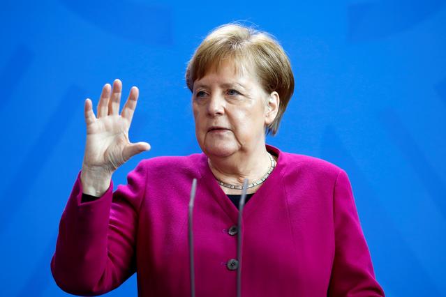 FILE PHOTO: German Chancellor Angela Merkel speaks during a media briefing about measures of the German government to avoid the further spread of the coronavirus disease (COVID-19), at the chancellery in Berlin, Germany, April 9, 2020. Markus Schreiber/Pool via REUTERS