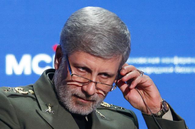 FILE PHOTO: Iranian Defence Minister Amir Hatami adjusts a headphone during the annual Moscow Conference on International Security (MCIS) in Moscow, Russia April 4, 2018. REUTERS/Sergei Karpukhin