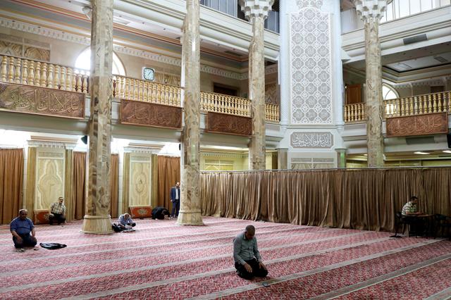 FILE PHOTO: Iranian worshippers pray as they keep social distancing at a mosque following the outbreak of the coronavirus disease (COVID-19), in Tehran, Iran, April 30, 2020. WANA (West Asia News Agency)/Ali Khara via REUTERS