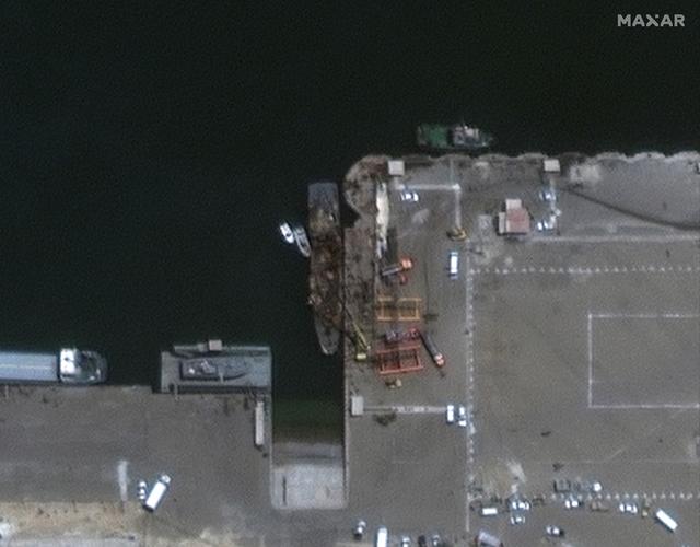 A satellite image shows an Iranian vessel Konarak, damaged in an aftermath of a friendly-fire anti-ship missile accident, in a port city of Konarak, Iran May 11, 2020. Satellite image 2020 Maxar Technologies/Handout via REUTERS