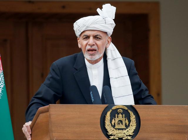 FILE PHOTO: Afghanistan's President Ashraf Ghani speaks during his inauguration as president, in Kabul, Afghanistan March 9, 2020. REUTERS/Mohammad Ismail